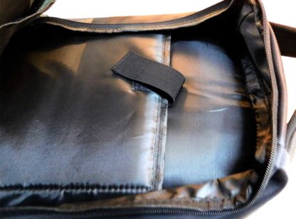 The back section showing the padded slot with velcro fastner