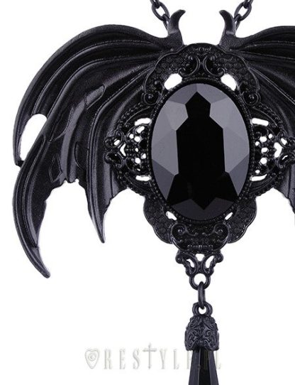 A close up showing the detailing on the bat wings and the drop bit