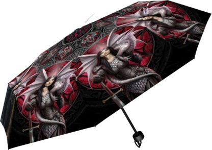 The umbrella features a proud warrior clad in scale mail armour.  A white dragon is curled around her shoulders held up by one hand, a sword in the other.  She's standing in front of a red shield - the colours are predominantly red and black.