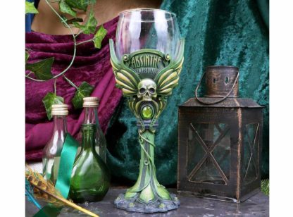 The goblet next to potion bottles - the words 'Absinthe, La Fee Verte' are inscribed
