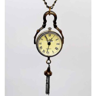 A small ball-shaped fob watch with a parchment coloured face and black roman numeral numbers and black hands. A chain tassle hangs from the bottom