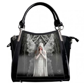 The front of this shiny black handbag features an angel, wings outstretched, clasping a red rose in her hands pressed together in prayer. A skull looks over her shoulder.